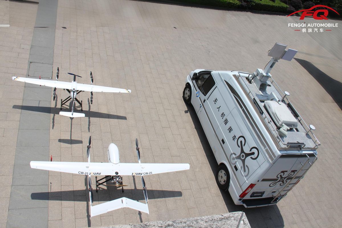 A Fengqi UAV command vehicle staged alongside two fixed-wing UAVs on a concrete apron — the kind of integrated airframe-and-vehicle system this article is about.